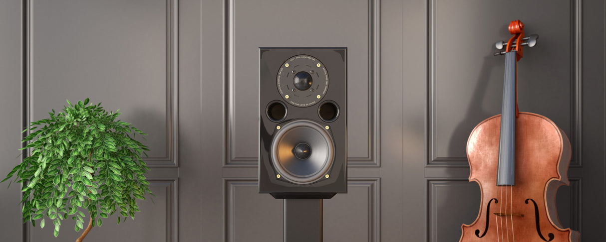 Acoustic Energy AE1 40th Anniversary speakers in gloss black finish on wooden stands in a modern listening room
