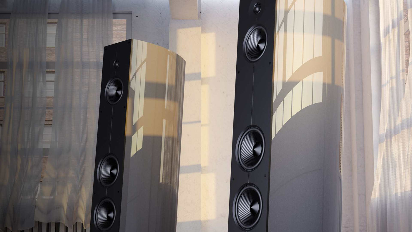 Acoustic Energy Corinium floorstanding speakers in Midnight Silver, a pair in a sunlit room
