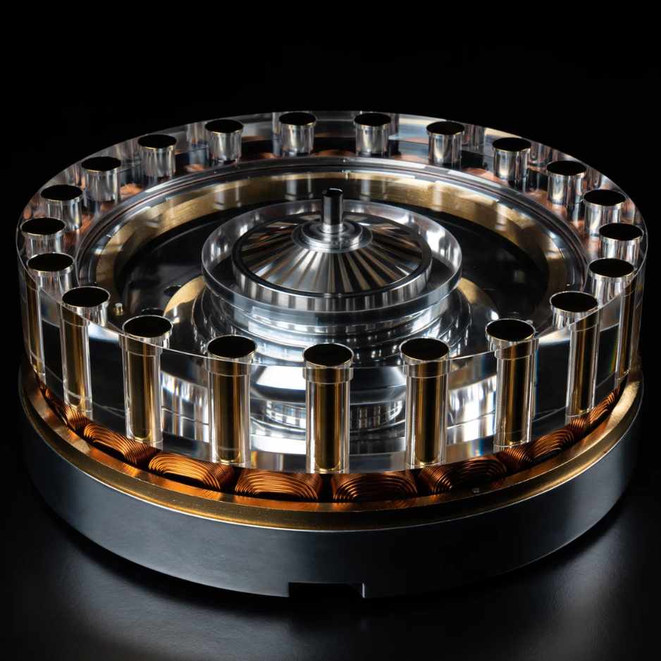 Wilson Benesch OMEGA Drive motor showing the 15-inch circumjacent radial force design with 21 magnetic poles and precision-wound copper coils
