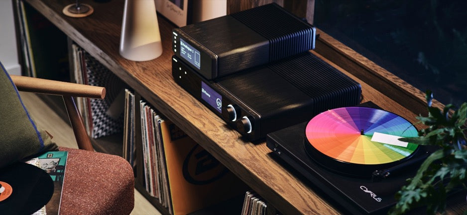 Cyrus 80 PRE on shelf with vinyl collection