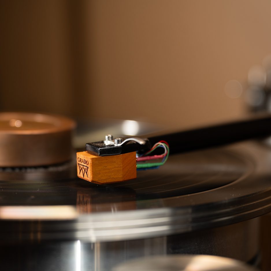 Grado Timbre cartridge warm-toned tonearm view with colored lead wires