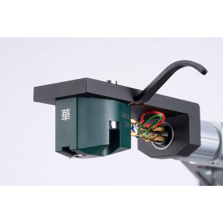 HANA EH Moving Coil Phono Cartridge (Open Box), green body mounted on a headshell with tonearm lead wires attached