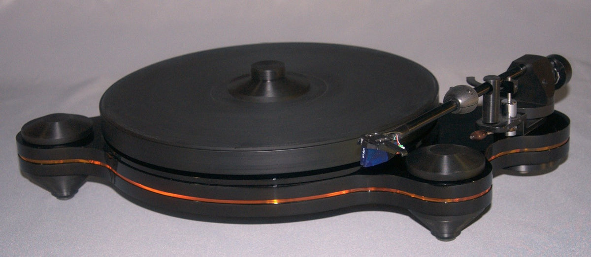 Oracle Audio Origine Acrylic Insert, Transparent Yellow, shown fitted in a black Origine Mk2 plinth, three-quarter view