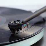 Rega Planar 6 RS AFC Turntable, Brushed Aluminum, Ania stylus tracking a record groove at platter level