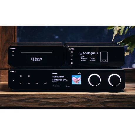 Cyrus 40 Series system stack with CD player, PPA, and amplifier on wooden shelf