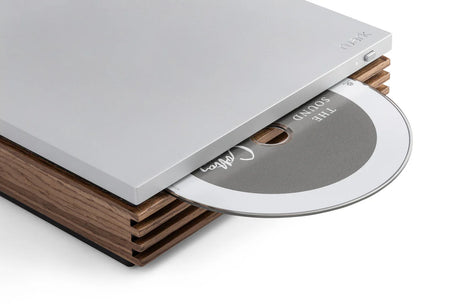 ruark audio r-CD100 CD Player Diagonal view with CD coming out of it