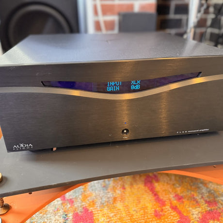 Audia Flight FLS 8 monoblock amplifier front panel with display showing input and gain at The Listening Room showroom