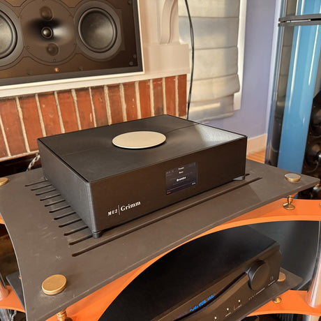 Grimm Audio MU2 on equipment rack at The Listening Room showing full unit with gold volume control