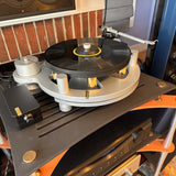Michell Gyro turntable front view showing suspended subchassis and gold pillars at The Listening Room