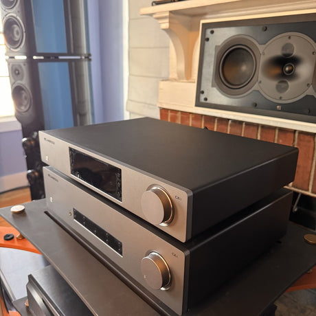 Cambridge Audio CXN100 and CXA81 three-quarter view showing displays and controls