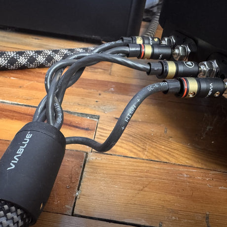 ViaBlue SC-6 Air speaker cable showing braided sleeve, splitter boot, and bi-wire runs