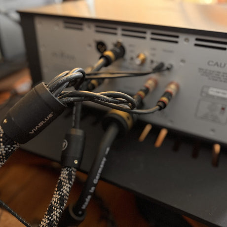 ViaBlue SC-6 Air speaker cables connected to amplifier rear panel showing Made in Germany branding