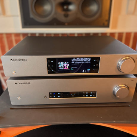 Cambridge Audio CXN100 displaying album art with CXA81 amplifier below at The Listening Room