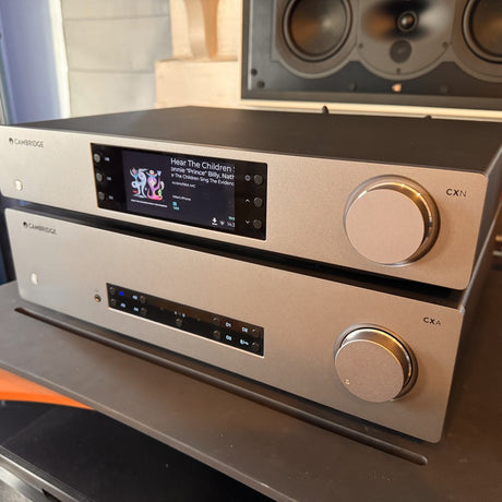 Cambridge Audio CXN100 network player Roon display with CXA81 Mk II in showroom setting