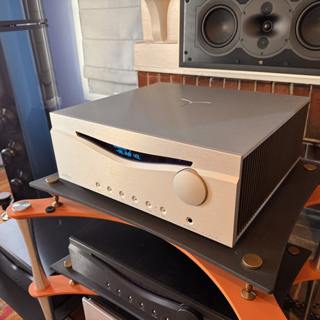 Audia Flight FLS 10 three-quarter left view showing heatsink fins and front panel