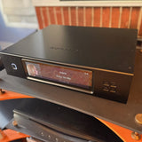 Aurender N20 music server three-quarter view with display showing now playing at The Listening Room