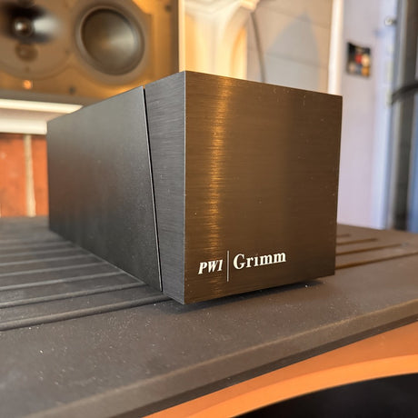 Grimm Audio PW1 front close-up showing branding and minimalist design