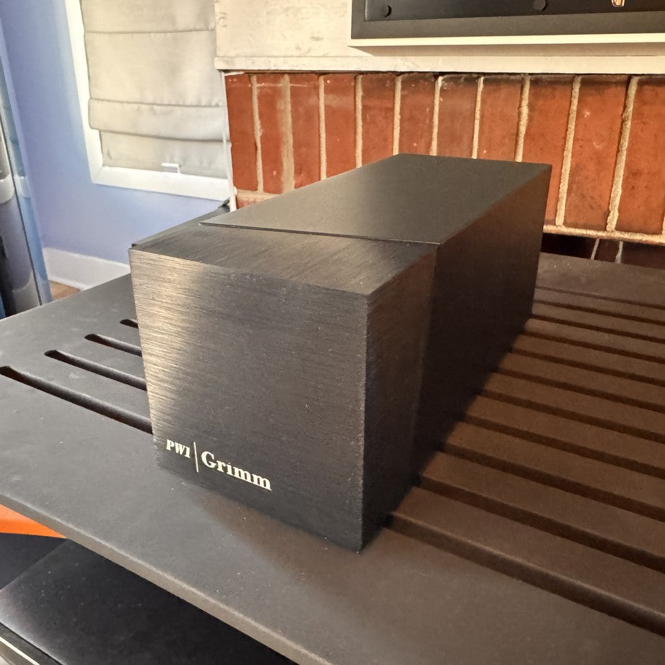 Grimm Audio PW1 phono stage three-quarter rear view showing two-piece enclosure design