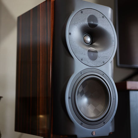 Perlisten S4b bookshelf speaker in High Gloss Ebony, front close-up showing DPC array tweeter and woofer