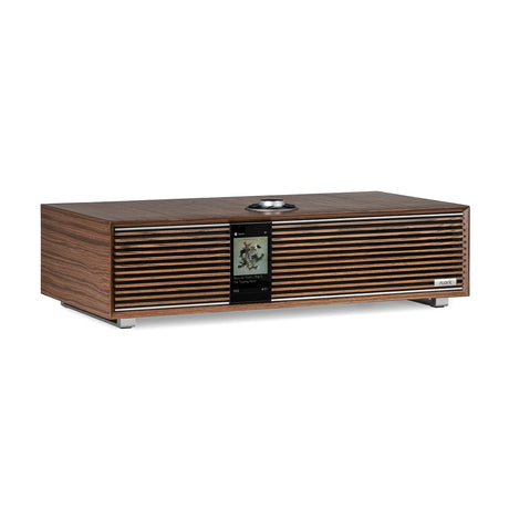 Ruark Audio R410 All-In-One Music System in Walnut, three-quarter view with display showing Spotify playback