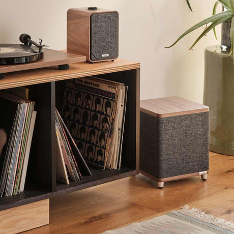 Ruark Audio RS1 Subwoofer - Lifestyle image with RS1 and turntable