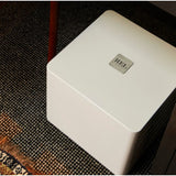 REL T/5x Subwoofer glosswhite lifestyle