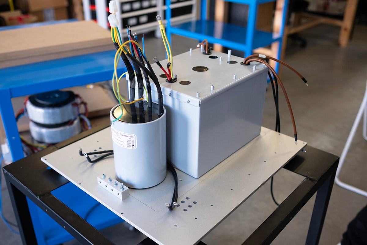 Audia Flight Strumento monoblock internal chassis, transformer assembly and capacitor banks