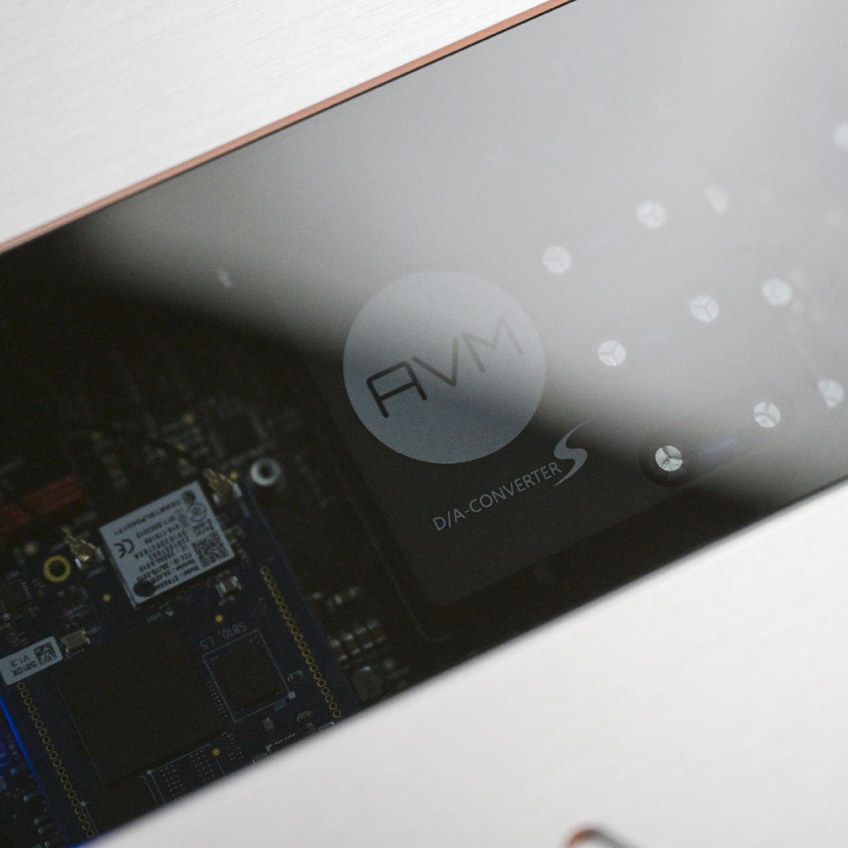 AVM Ovation AS 8.3 S Streaming Integrated Amplifier, Silver, lid close-up with the D/A-Converter S module visible inside