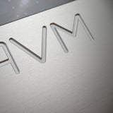 AVM Ovation AS 8.3 S Streaming Integrated Amplifier, Silver, engraved AVM logo on the lid close-up