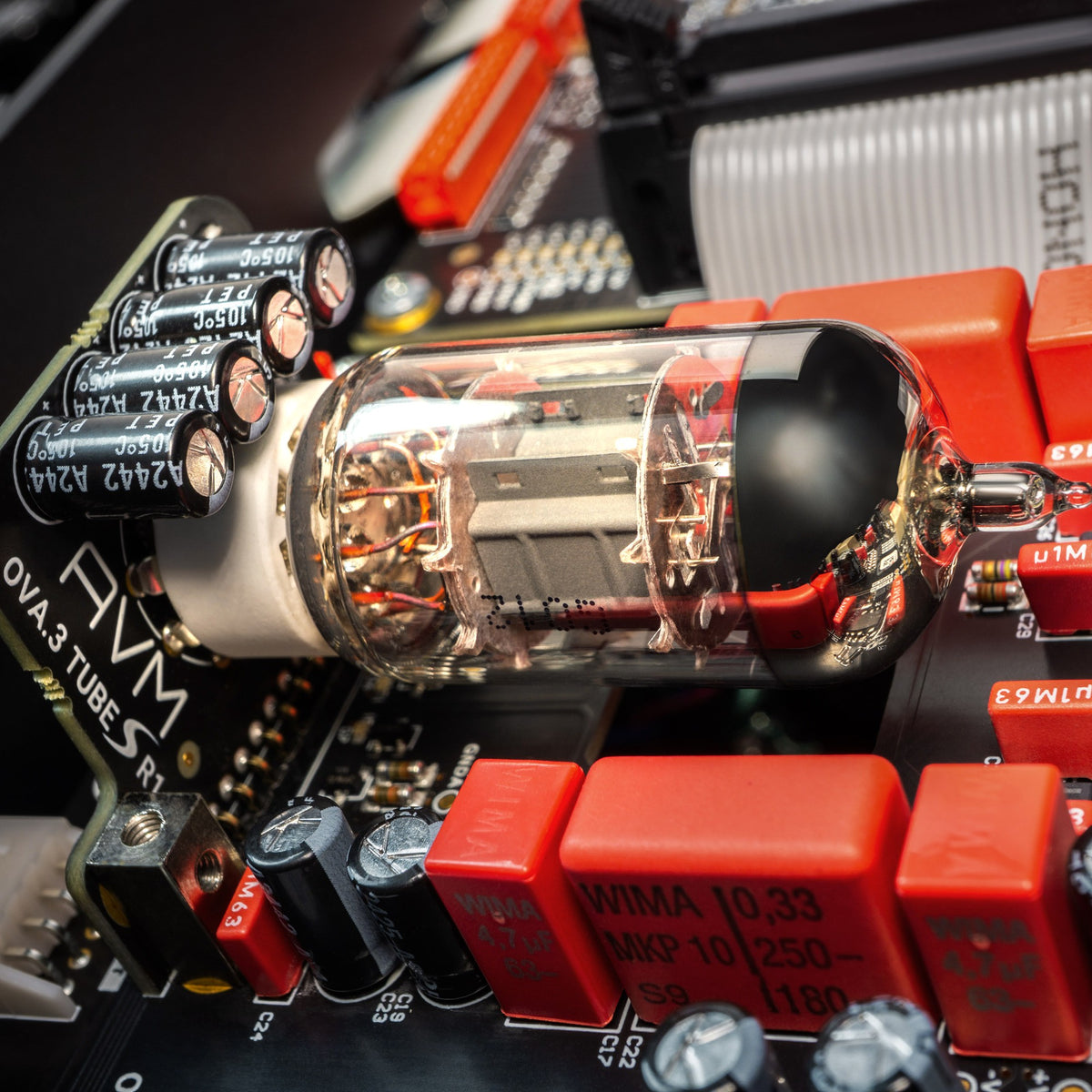 AVM Ovation CS 8.3 S Streaming CD Receiver, internal close-up of a vacuum tube on the OVA.3 TUBE S board