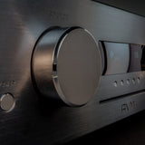 AVM Ovation CS 8.3 S Streaming CD Receiver, Black, front fascia close-up with the source knob and display