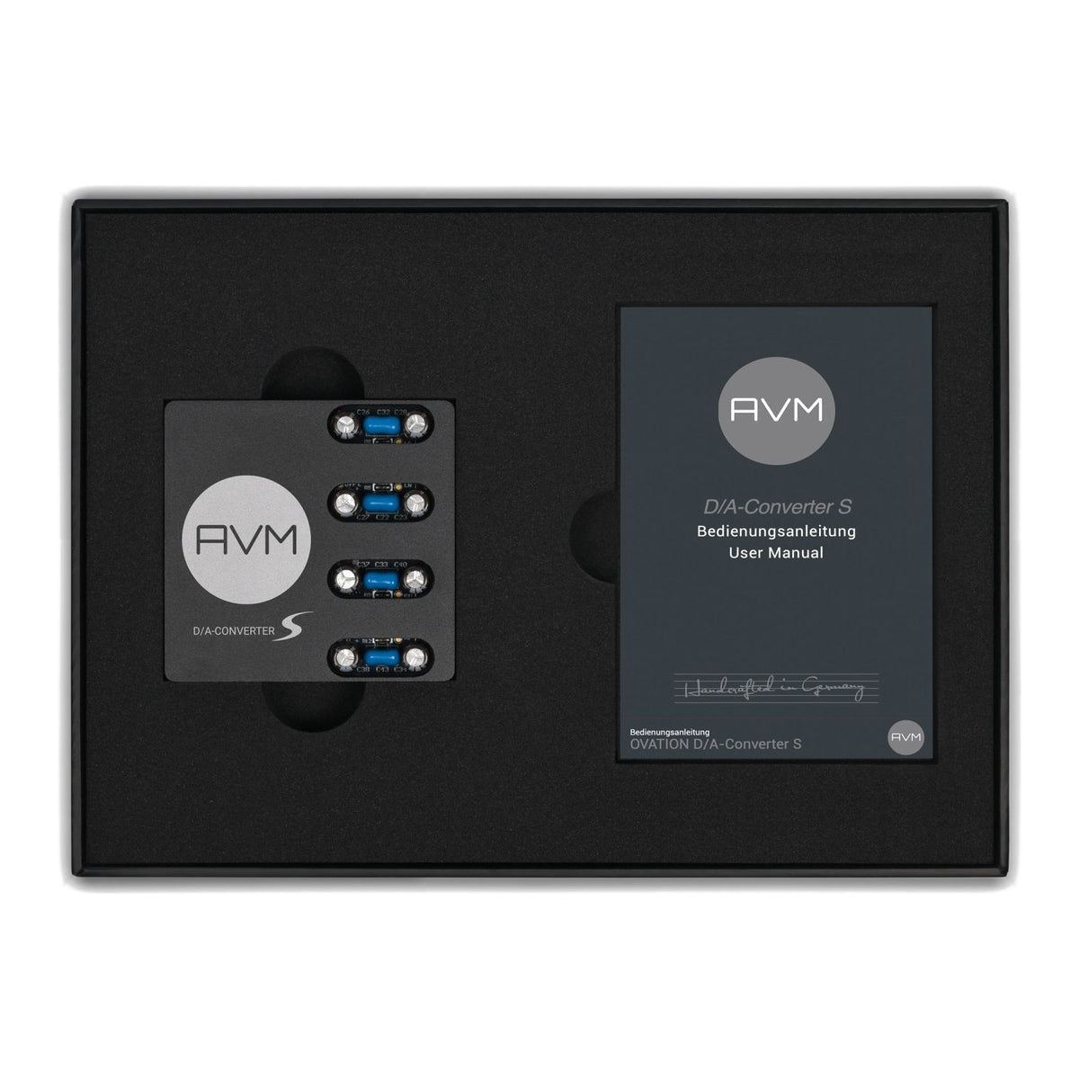 AVM Ovation D/A-Converter S (S-DAC) Upgrade Module, top view of the boxed set with the user manual