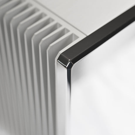 AVM Ovation SA 8.3 Lite Stereo Power Amplifier, Cellini chrome, heat sink fins and chrome front corner close-up