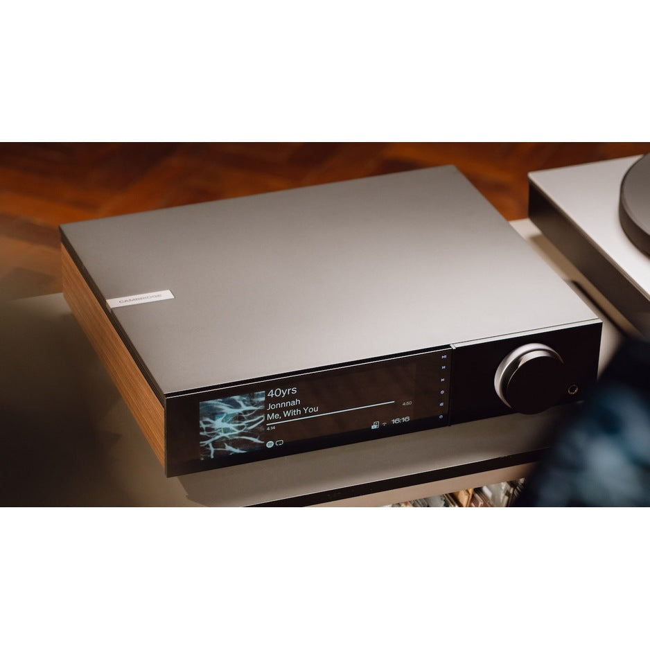 Cambridge Audio Evo 300 streaming amplifier on a media console