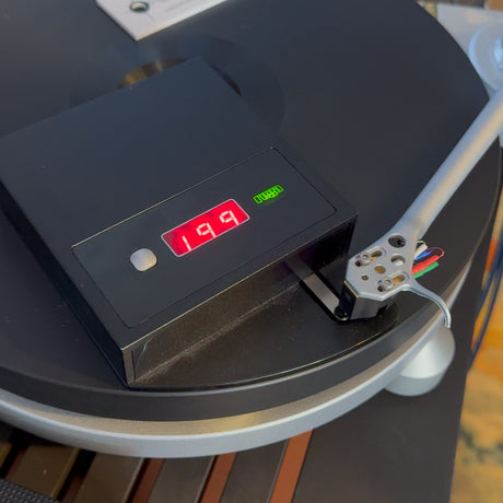Phono cartridge mounting and alignment service, digital stylus force gauge close-up under the headshell