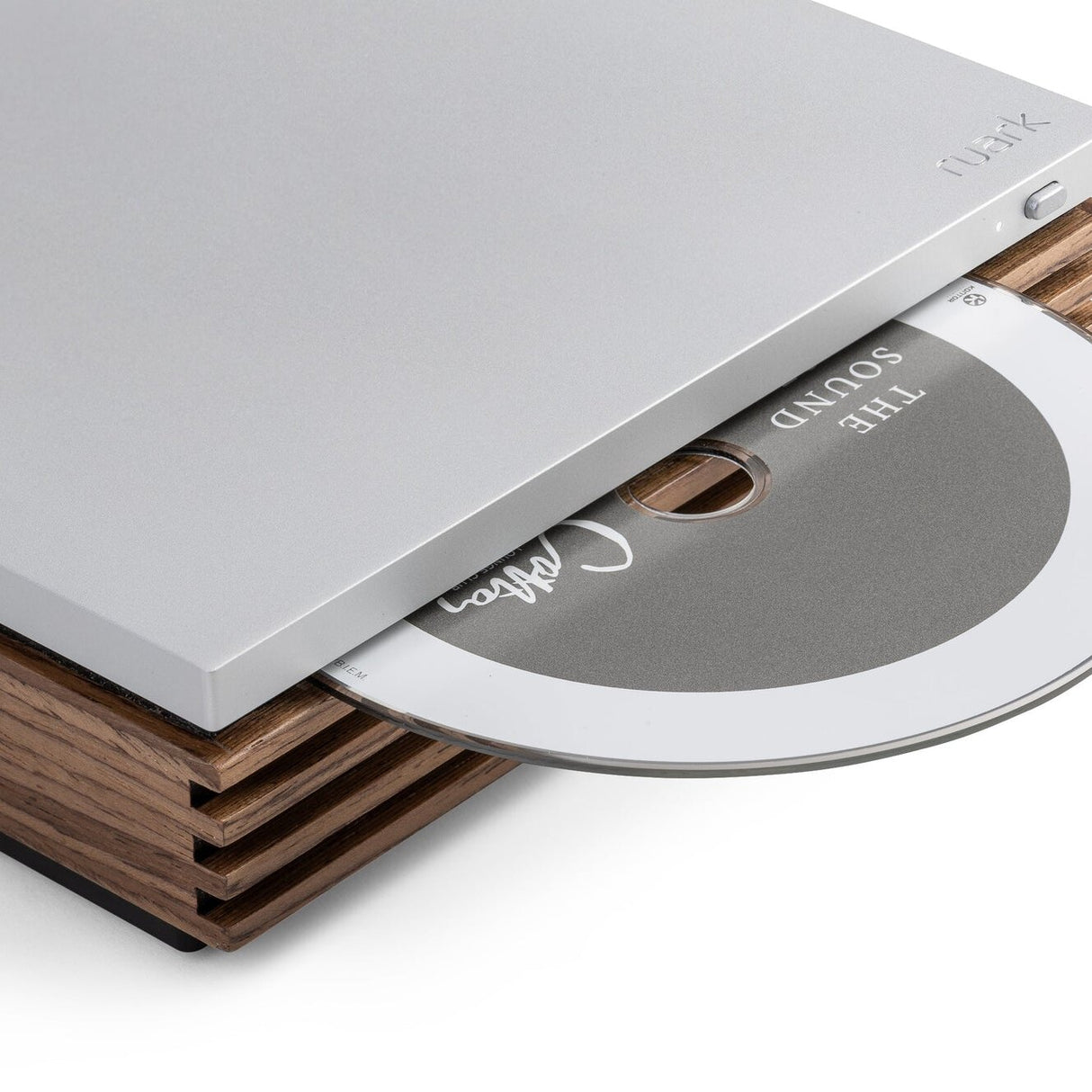 Ruark Audio R-CD100 USB CD Player loading a CD into the slot