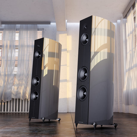 Acoustic Energy Corinium floorstanding speakers in Midnight Silver finish, pair shown in living room setting