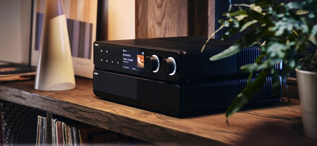 Cyrus 80 Series stack on shelf with vinyl records