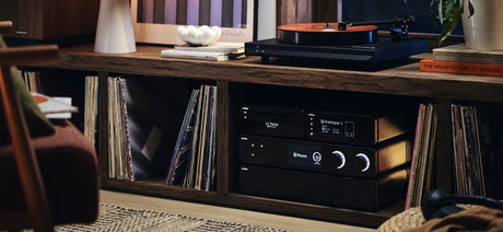 Cyrus 80 AMP in media console with turntable setup