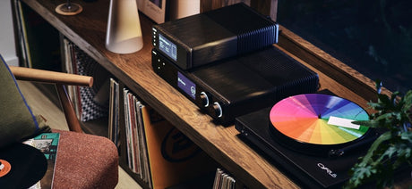 Cyrus 80 AMP on shelf with vinyl record collection