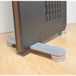 Diptyque Adjustable Aluminum Feet installed on speaker base, three-quarter view