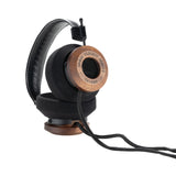 Grado GS1000 Classic Series Open-Back Headphones, Mahogany, angled view resting on a wooden headphone stand