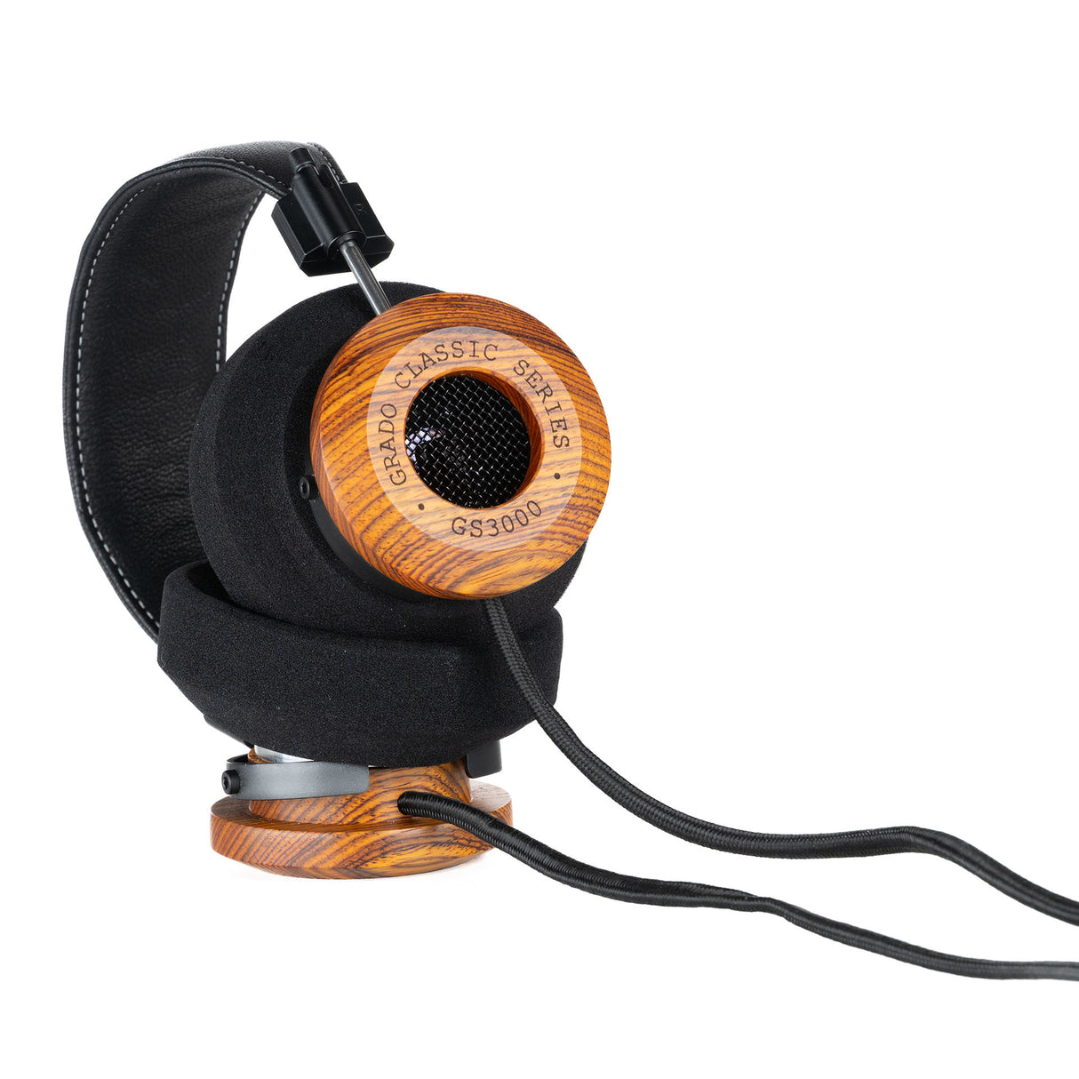 Grado GS3000 Classic Series Open-Back Headphones, Cocobolo, angled view resting on a cocobolo headphone stand