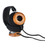 Grado GS3000 Classic Series Open-Back Headphones, Cocobolo, angled view resting on a cocobolo headphone stand