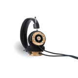 Grado Hemp Classic Series Open-Back Headphones, Hemp and Maple, angled view resting on a headphone stand with the cable coiled