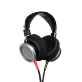 Grado Signature HP100 SE Open-Back Headphones, Space Grey, three-quarter view from the cushion side with the detachable cable attached