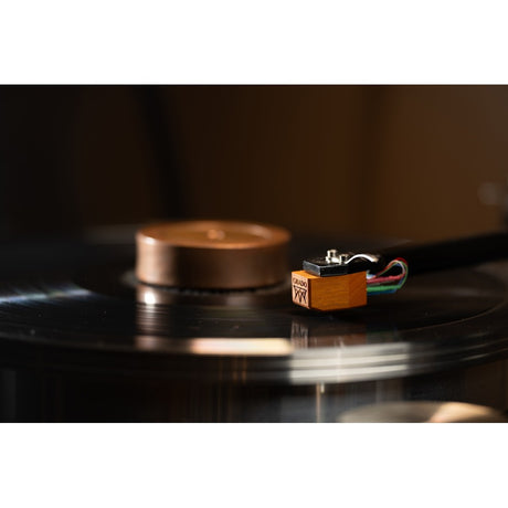 Grado Master4 cartridge tracking vinyl record, American Osage wood body visible