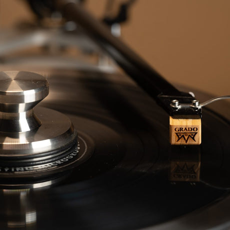 Grado Timbre cartridge with record weight on platter