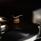 Grado Timbre cartridge closeup showing GRADO branding on vinyl
