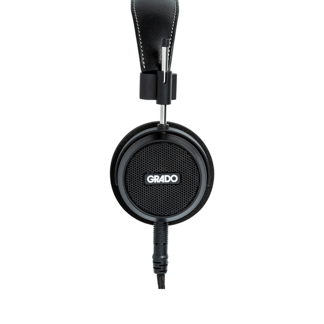 Grado Signature S150 Open-Back Headphones, Matte Black, side profile of a single earcup with the Grado badge facing camera